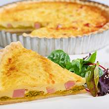 Quiche with Ham, Sweet Peas and Caramelized Onions